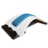 Stretching the back on the Raddrizza Schiena back stretcher with acupressure